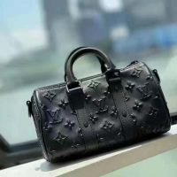 Louis Vuitton Men City Keepall in Black Monogram Seal Leather