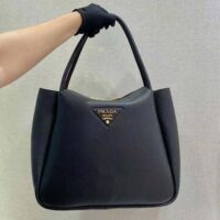 Prada Women Medium Leather handbag with the Prada Metal Lettering Logo Illuminating Its Center-black (1)