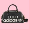 Gucci Unisex Adidas x Gucci Mini Duffle Bag Black Leather Interlocking G